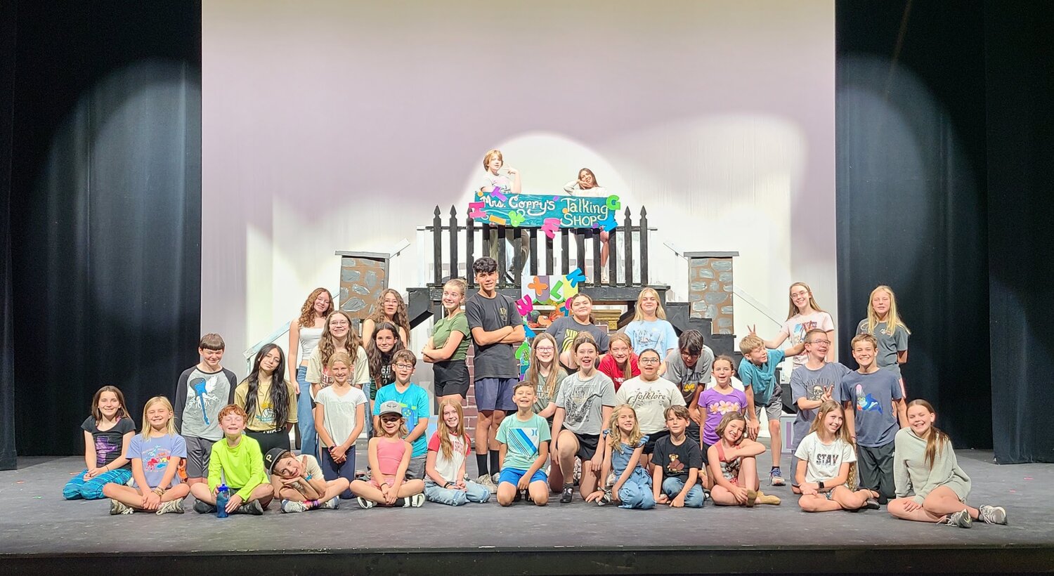 The cast of “Mary Poppins Jr.” takes a quick photo break while rehearsing their show-stopping number “Supercalifragilisticexpialidocious.” See the show Aug. 15-17 in the Pagosa Springs High School auditorium.