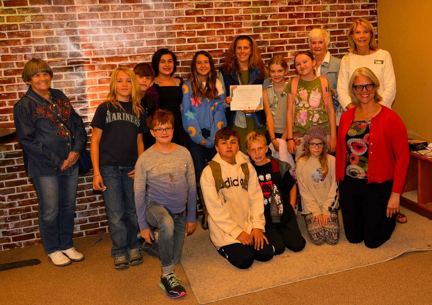 Pagosa Peak Open School, teacher Rue Graham (2023 grant recipient) poses with her students and, from left, Rotarians Melanie Garrett, CiCi Stuart, Kim Moore and President Cindi Galabota.