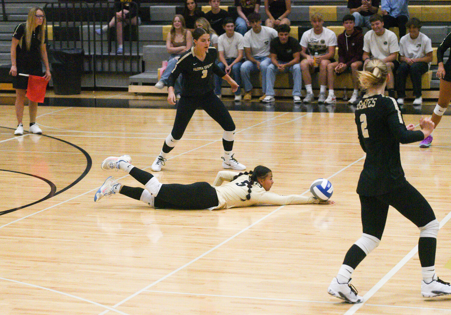 Lady Pirate Charity Domingo saves the ball against the Montezuma-Cortez Panthers on Saturday, Sept. 14. The Lady Pirates defeated the Panthers 3-1.