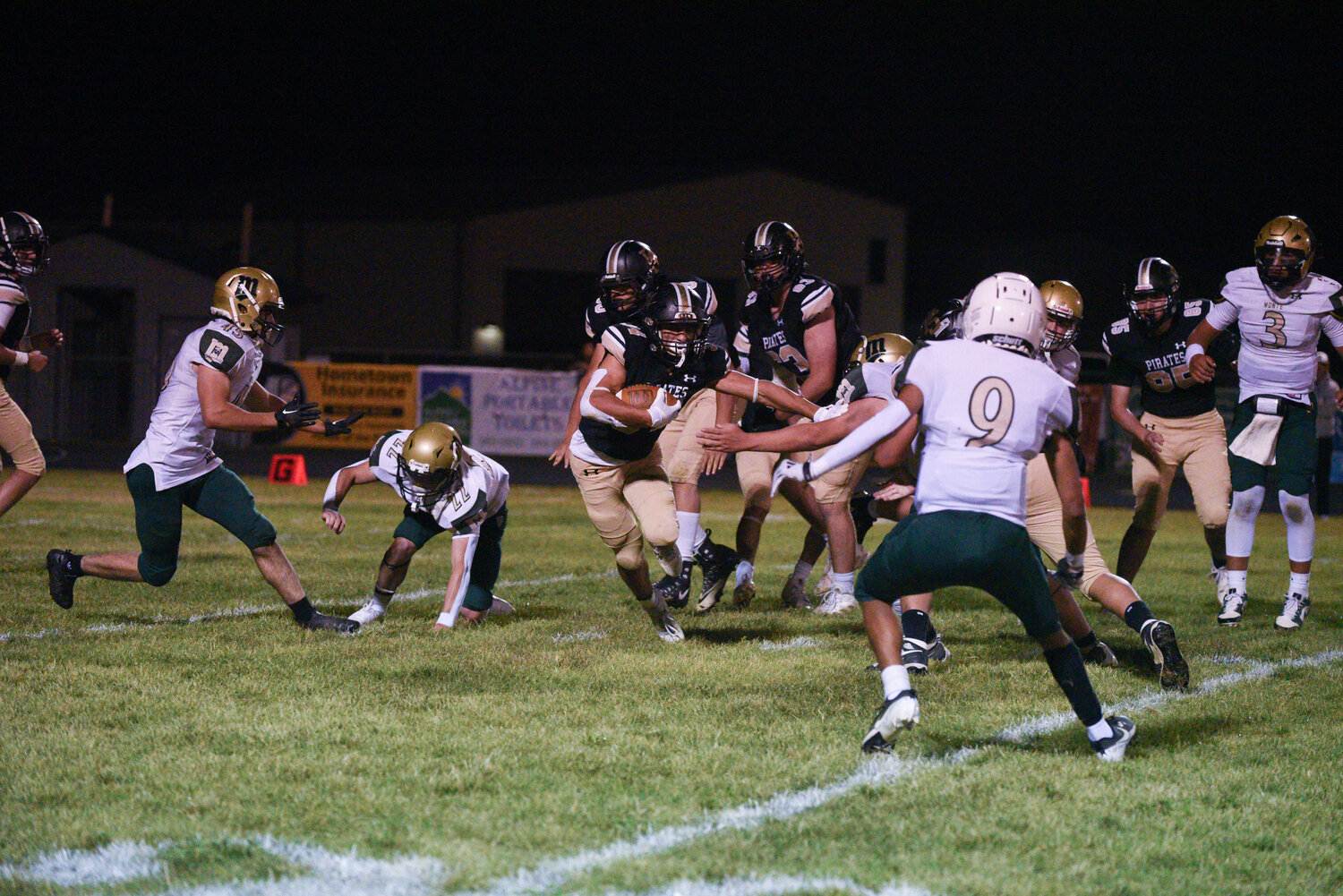 Pirate running back Colton Lucero breaks away from multiple Monte Vista defenders in Friday night’s homecoming win. Lucero led the Pirates in rushing with a total of 360 yards and three touchdowns on the night.