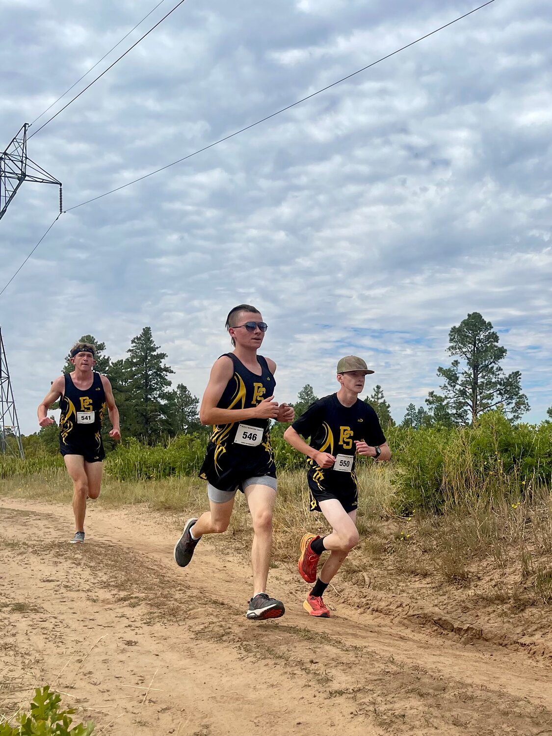 Merrick Tudor, Eli Nehring and Dylan Dempster stay close during the Boggy Draw Bear Chase on Sept. 20. The trio finished within three seconds of each other.