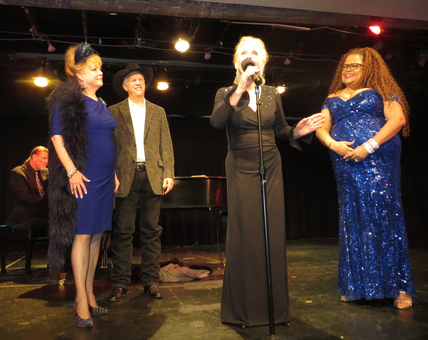 Popular singer-songwriter Tim Sullivan and his family will perform Nov. 2 in a cabaret-style benefit concert at 7:30 p.m. in Durango. From left to right are Jon Weber on piano, KT Sullivan, Tim Sullivan, Elizabeth Sullivan and Natalie Douglas. All proceeds go to the Jim and Elizabeth Sullivan Foundation for the Arts to provide scholarships for music lessons, instruments and performance opportunities for local youth.