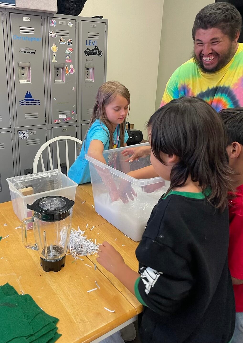 Third- and fourth-graders at Pagosa Peak Open School work with the Aspen House community on a holiday card fundraiser.