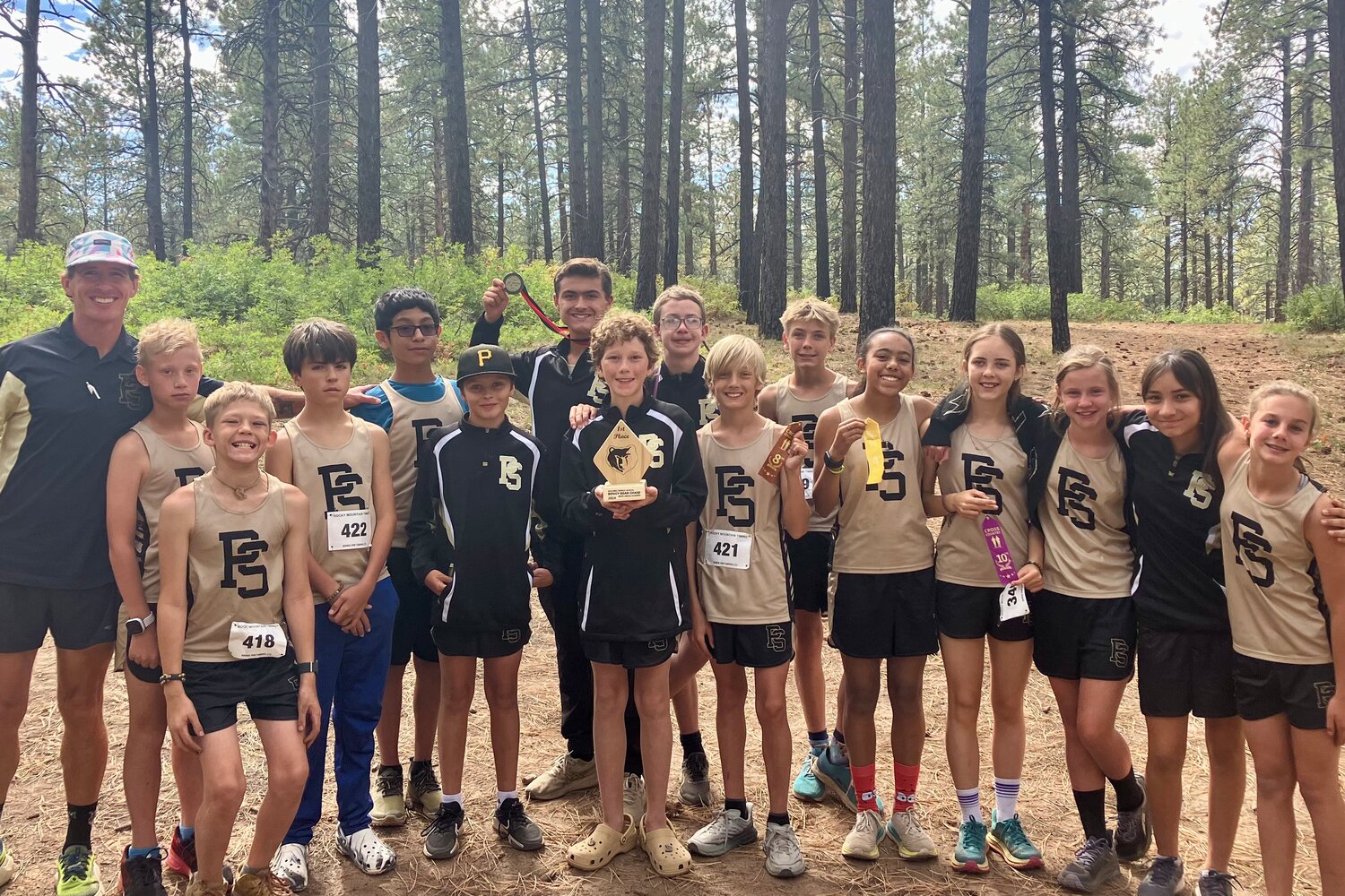 The Pagosa Springs Middle School cross-country team poses following the Boggy Draw Bear Chase in Dolores on Sept. 20, where the boys’ team took first.