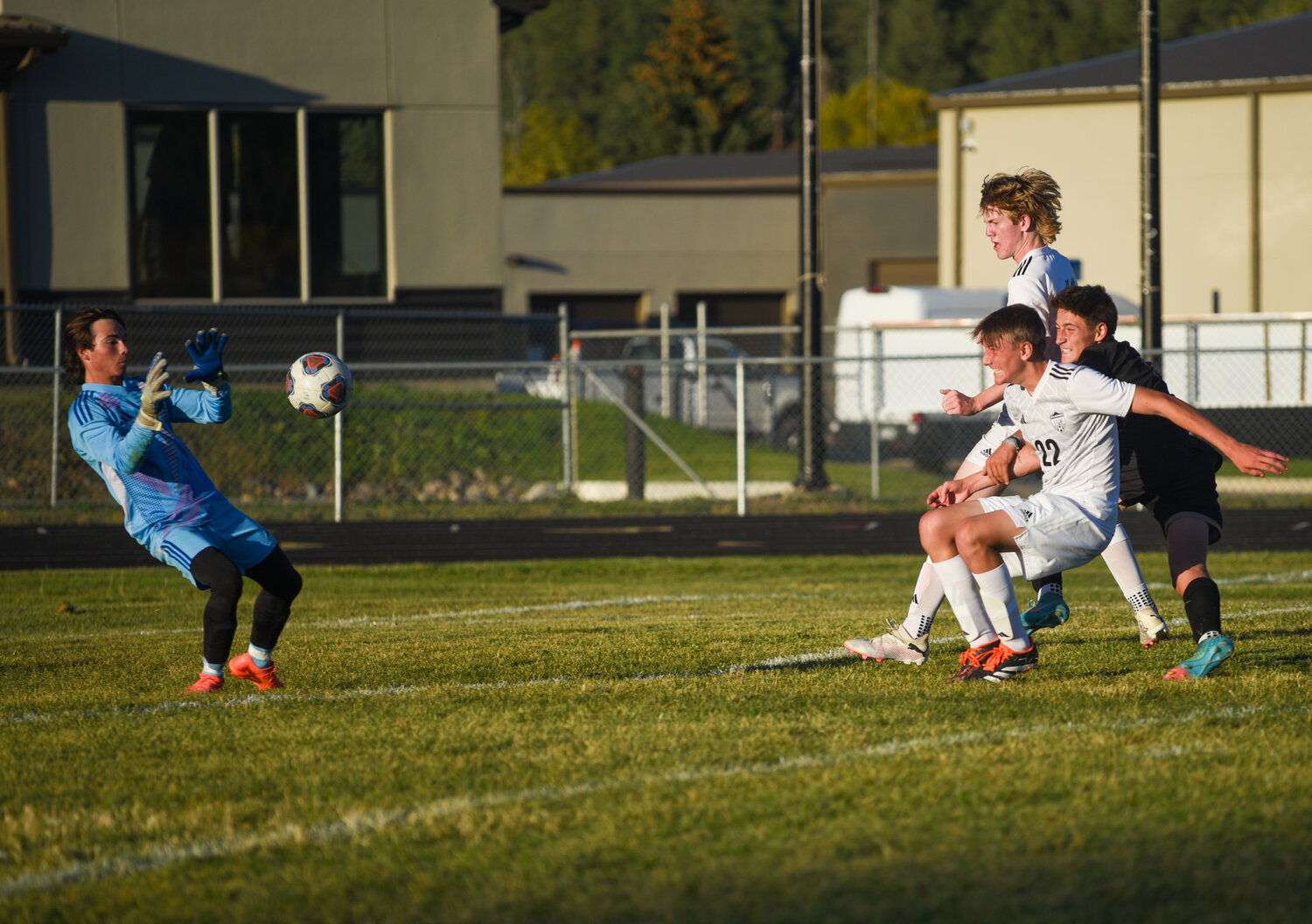 Chance Ramirez tries to fight through two Wolverine defenders to create an opportunity to score. The Pirates fell 2-0.