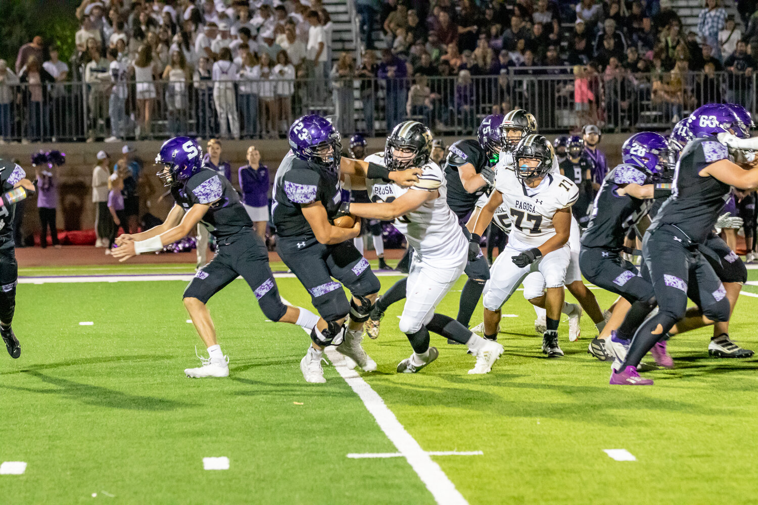 Pirates’ defensive linemen Aven Cole and Jesus Serratos break into the Spartans’ backfield disrupting the play. Cole led the Pirates in tackles on the night, recording nine solo tackles.