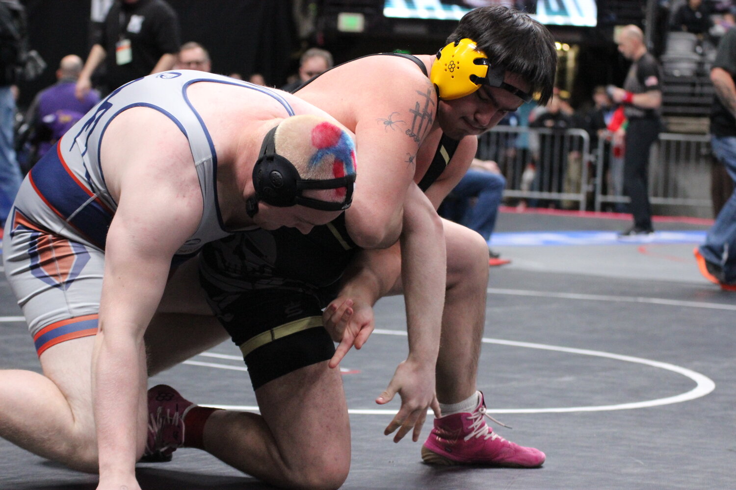 Antonio Quezada works to earn points against an opponent in last week&rsquo;s state wrestling tournament. Quezada represented the Pirates in the 285-pound weight class.