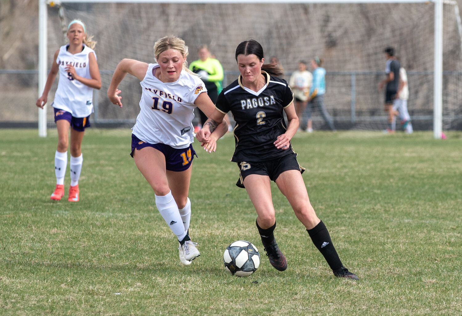 Elizabeth Currier dribbles past a Bayfield defender during the Lady Pirates’ win on Tuesday, April 15, at Golden Peaks Stadium. Currier scored the Lady Pirates’ first goal of the day, leveling the score at 1-1.