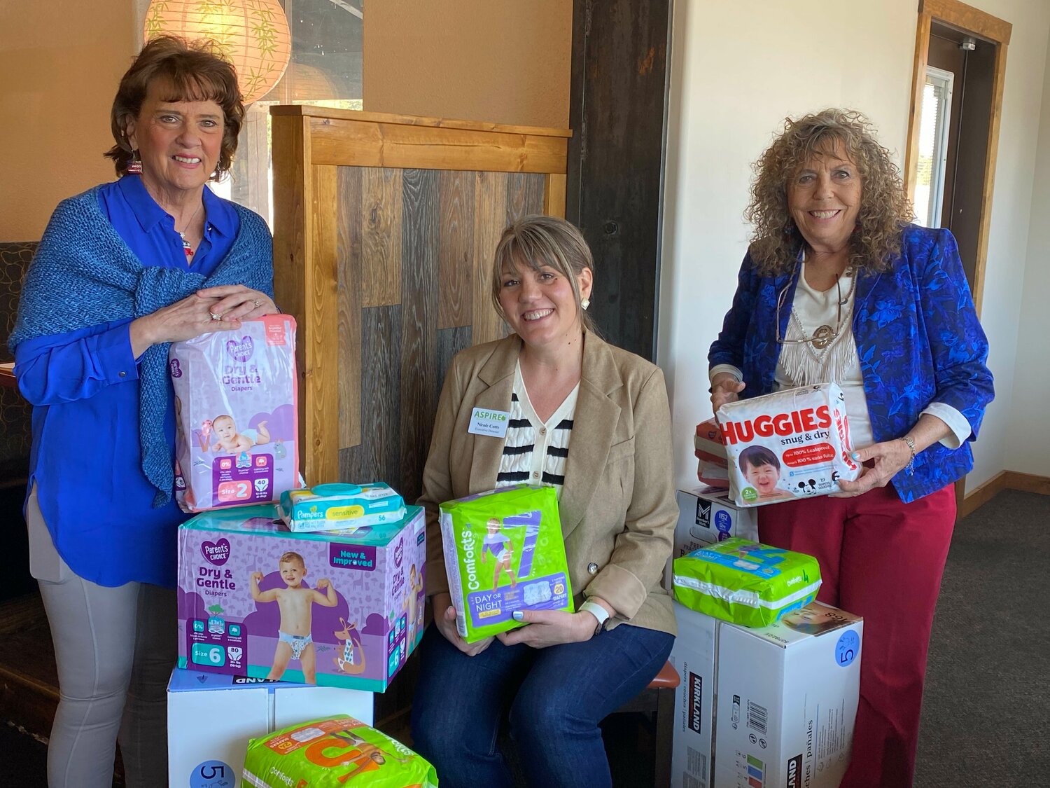 Aspire Medical Services and Education Executive Director Nicole Cotts, center, poses with Michele Turkey, left, and Denise Fisk and diapers donated to the nonprofit center. At the most recent Archuleta County Republican Women (ACRW) meeting, Cotts (center) presented what is new and changing at Aspire. The group reported that listening to Cotts passion and enthusiasm for her life-long calling was inspirational. Aspire&rsquo;s mission is to empower individuals and families to thrive physically, emotionally and socially by providing medical services and education in a safe and supportive environment. Aspire has impacted more than 260 clients with more than 1,500 appointments. Nine hundred classes were taken and 65 babies were born through its prenatal care program.