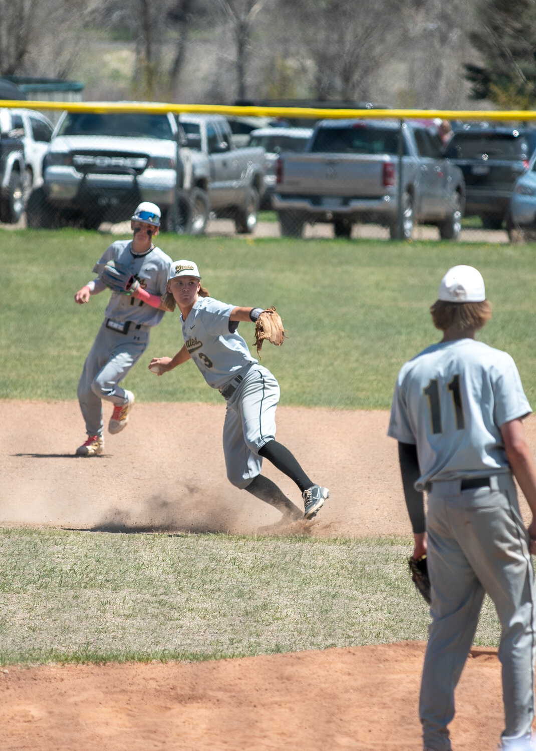 Pirate Taylor Wells makes a throw to first during the first half of the team&rsquo;s doubleheader with the Bayfield Wolverines on Saturday, May 3. The team split the doubleheader with the Wolverines and is now 9-9 on the season.