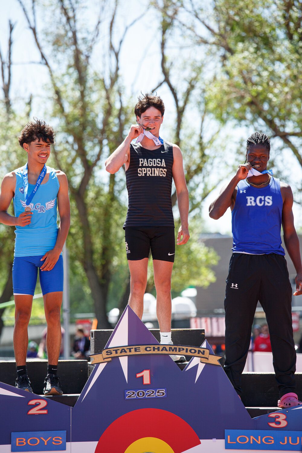 Abigail Nehring, left, and Creede Dozier stand atop the podium on Friday, May 16, after winning the 3A state titles in girls’ discus and boys’ long jump, respectively. The pair of Pagosa Springs High School Pirates claimed the titles within minutes of each other at the state meet. For more on the state meet, see pages A12 and A13.