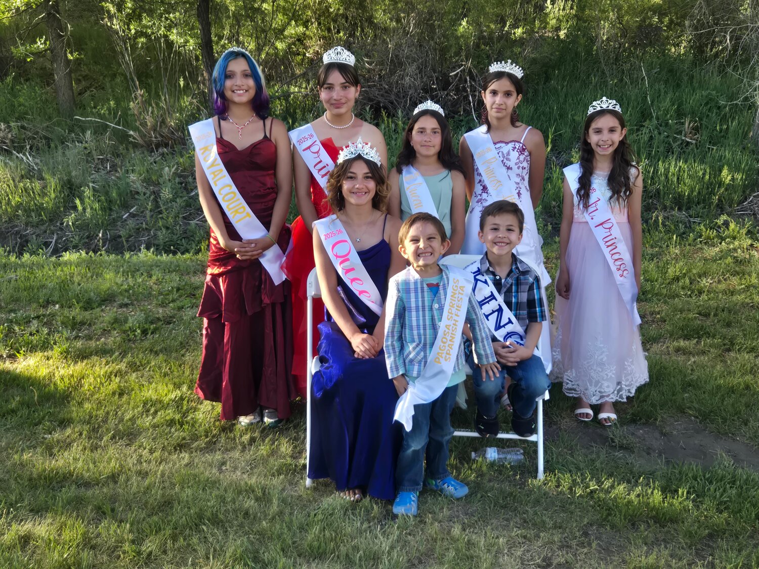 The outgoing and incoming Spanish Fiesta royalty were honored at Saturday&rsquo;s Spanish Fiesta event. Above: The 2025-2026 royalty were crowned on Saturday, June 14. In the back row are Tesla Morris, royal court; Lillyan Vega, princess; Ana Lucia Romero Gallegos, queen attendant; Hadassah Trujillo, princess attendant; and Amaryah Trujillo, junior princess. In the middle row are Bella Postolese, queen and Anthony Rodriguez, king. In front is David Trujillo, prince. Left: The outgoing royalty capped off their year of service with Saturday&rsquo;s event. The royalty are involved in raising money for scholarships for graduating youth to attend college, visiting the assisted living homes, picking up trash around our community, and are involved in various other community events. The outgoing royalty are queen Dazia Villarreal, junior princess Cambria Herrera and princess attendant Annissa Chavez.
