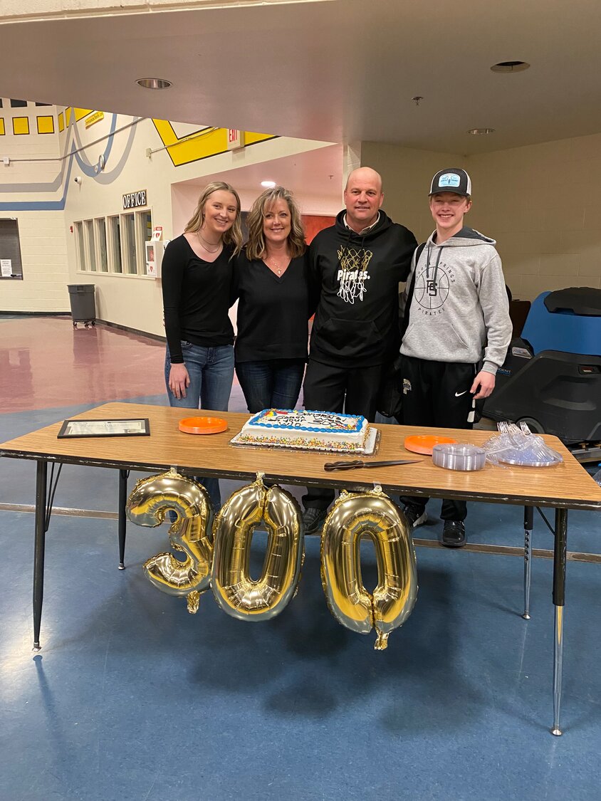 Wes Lewis, third from the left, stands with his family during a 2023 celebration of his 300th coaching win. Lewis logged a 336-94 record in 18 years of coaching at Pagosa Springs High School.