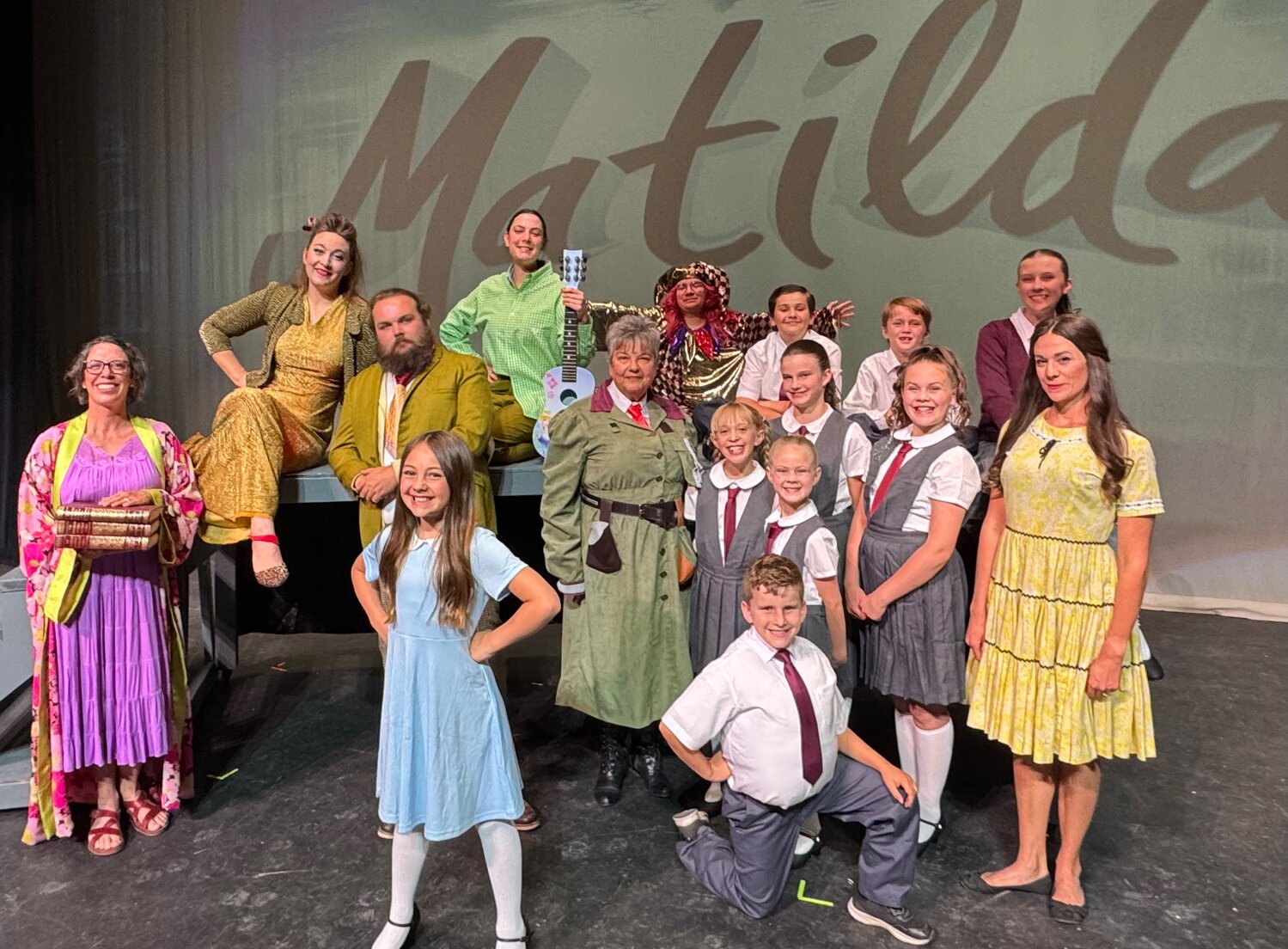 Matilda, with her Curtains Up Pagosa castmates, are ready to sing and dance in their entertaining musical. The cast will present four performances of “Matilda the Musical” June 26-28 in the Pagosa Springs High School auditorium.