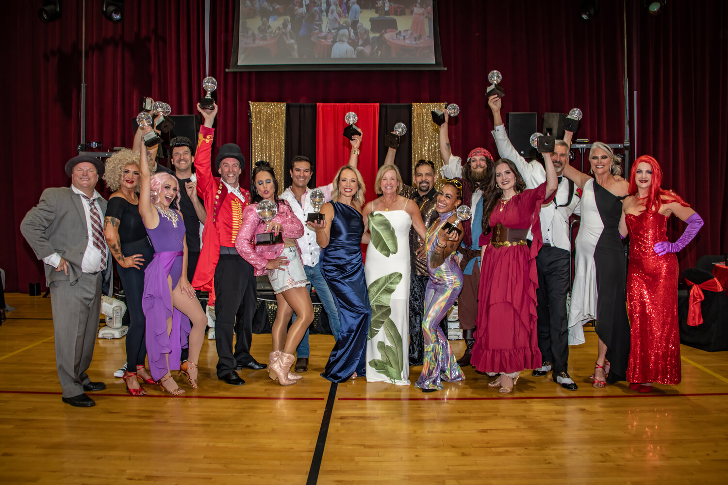 The Pagosa stars and their coaches celebrate at the end of the final Dancing with the Pagosa Stars event on Aug. 16.