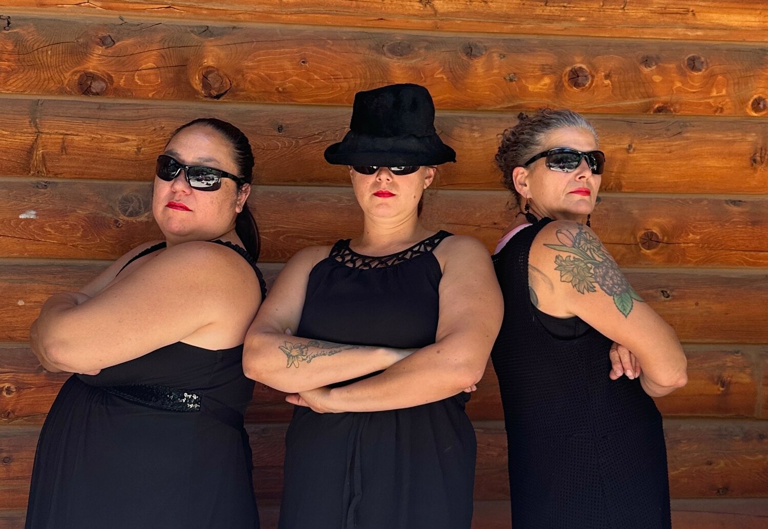 Team W.I.B (Women in Black), part of Rise Above Violence&rsquo;s upcoming Runway for Rise event, includes Donna Muir, Meagan Zimpfer and Kim Buscaglia.