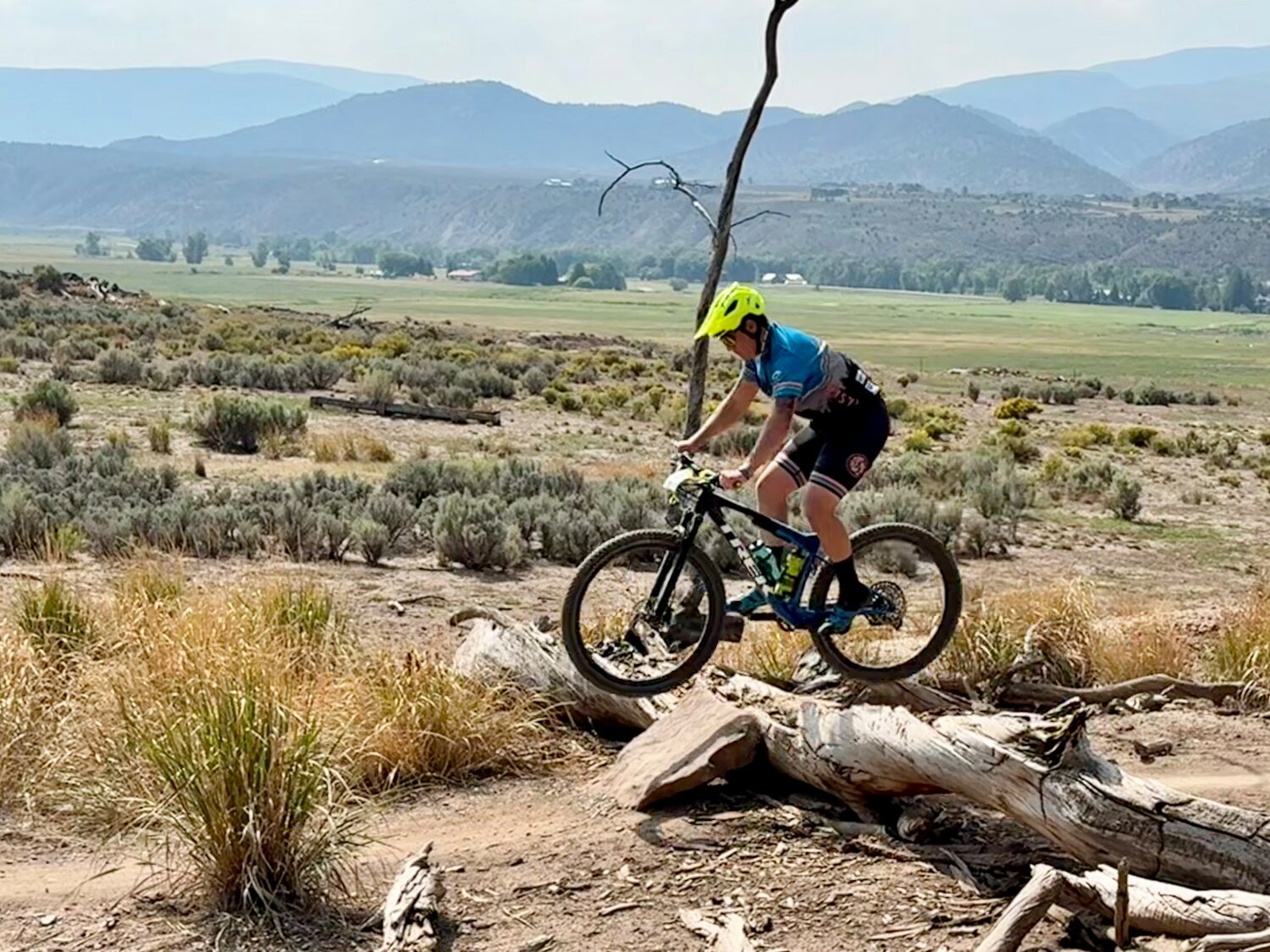 Junior Aaron Sowle has a little fun and gets some air off one of the optional features on the course at the Haymaker Classic in Eagle on Sept. 6.