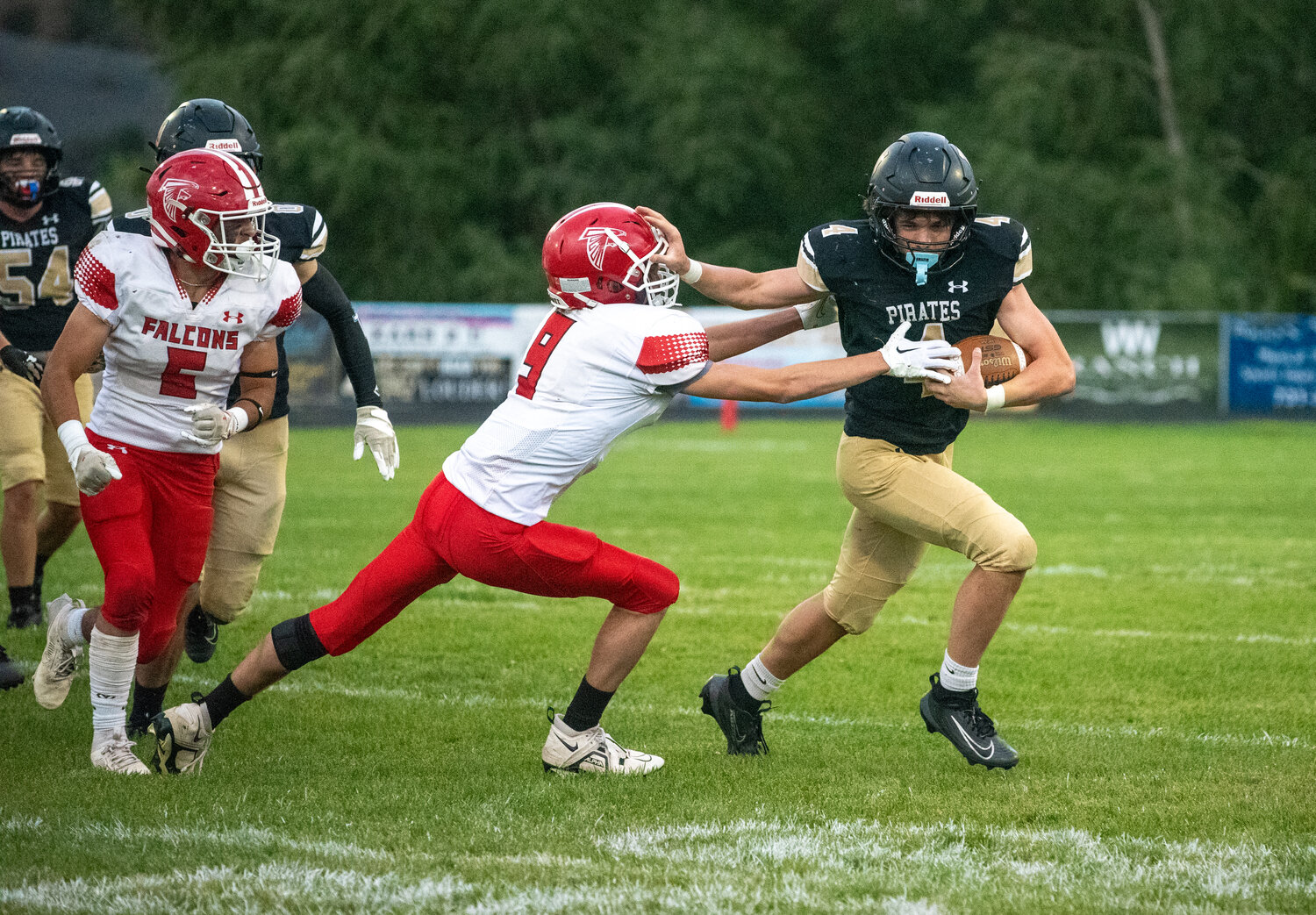 Alex Pacheco breaks away from a Centauri defender during the team&rsquo;s matchup on Thursday, Sept. 4. Pacheco led the Pirates in rushing yards on the night, putting up a total of 64 yards on 10 carries.