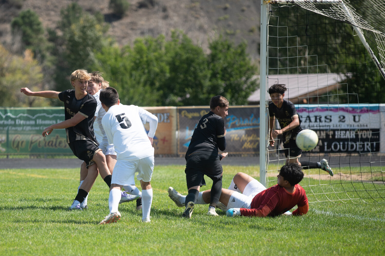 Pirate Ryder King sends the ball to the back of the net during the team&rsquo;s victory over the Aztec Tigers on Saturday, Sept. 6. King scored two goals on the day, with the Pirates winning 7-0.