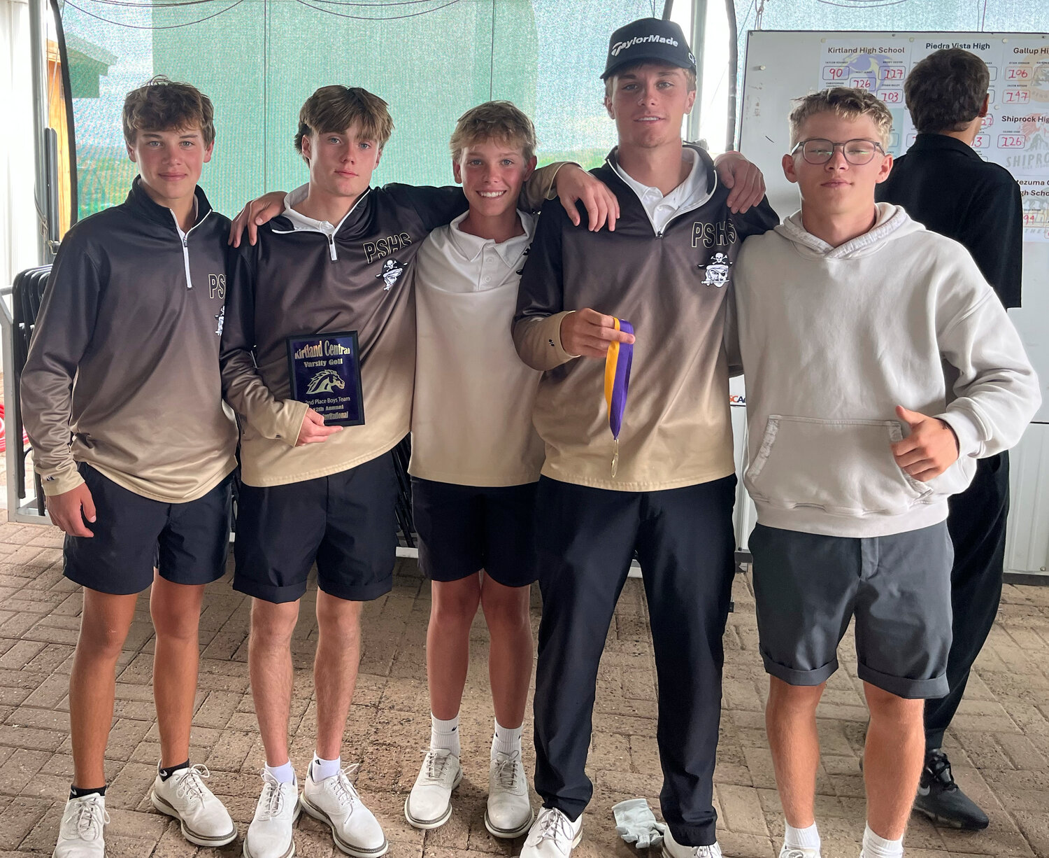 The Pirates pose after taking second at the Soria Invitational in Kirtland on Monday, Sept. 22. Johnathon Smith won on the day, shooting six under par and logging his first bogey-free round.