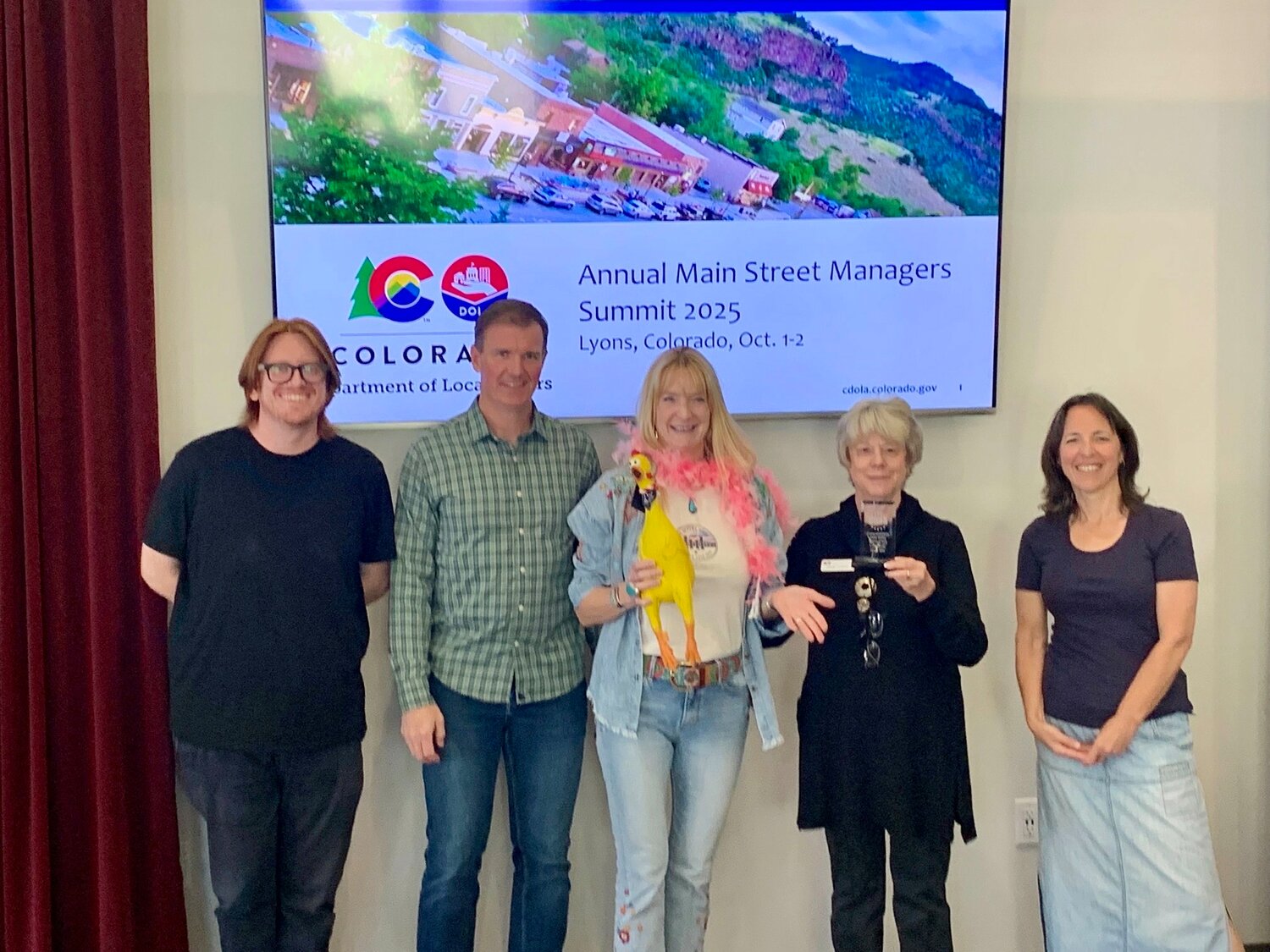 The Colorado Main Street network recognizes Pagosa Springs Main Street as Community of the Year and Kathleen McFadden as Manager of the Year. From left to right are Matt Gordon, Colorado Main Street specialist; Larry Lucus, Colorado Main Street architect; McFadden; Gayle Langley, Colorado Main Street coordinator; and Traci Stoffel, Colorado Main Street specialist.