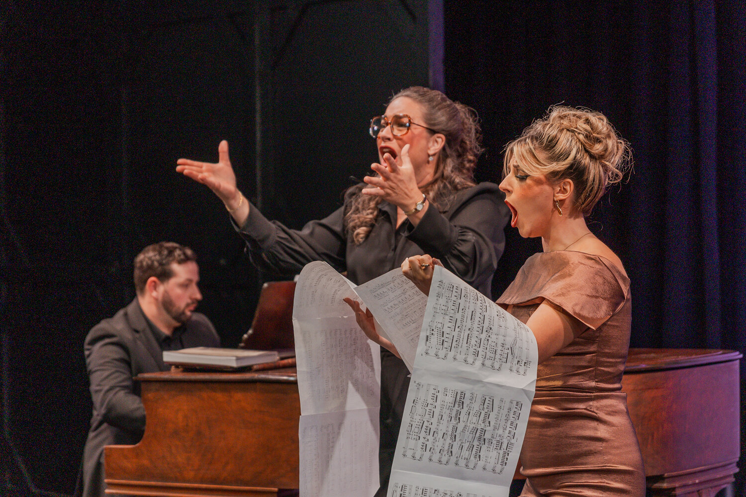 Laura Moore as Maria Callas demonstrates Lady Macbeth’s entrance to Samantha Luck (Sharon Graham), with Dale Scrivener (Manny Weinstock) at the piano in “Master Class.” Additional performances are set for Oct. 10 and 11 at the Pagosa Springs Center for the Arts.