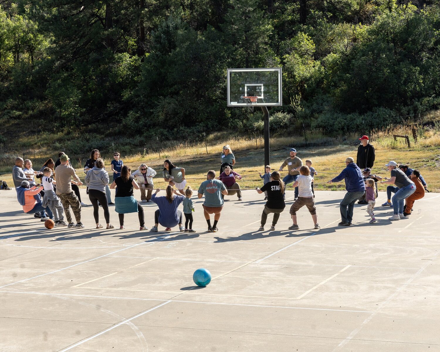 Participants take part in a group activity at a retreat at Project Sanctuary’s Patriot Pines. The organization is a finalist in the 2025 Defender Service Awards.