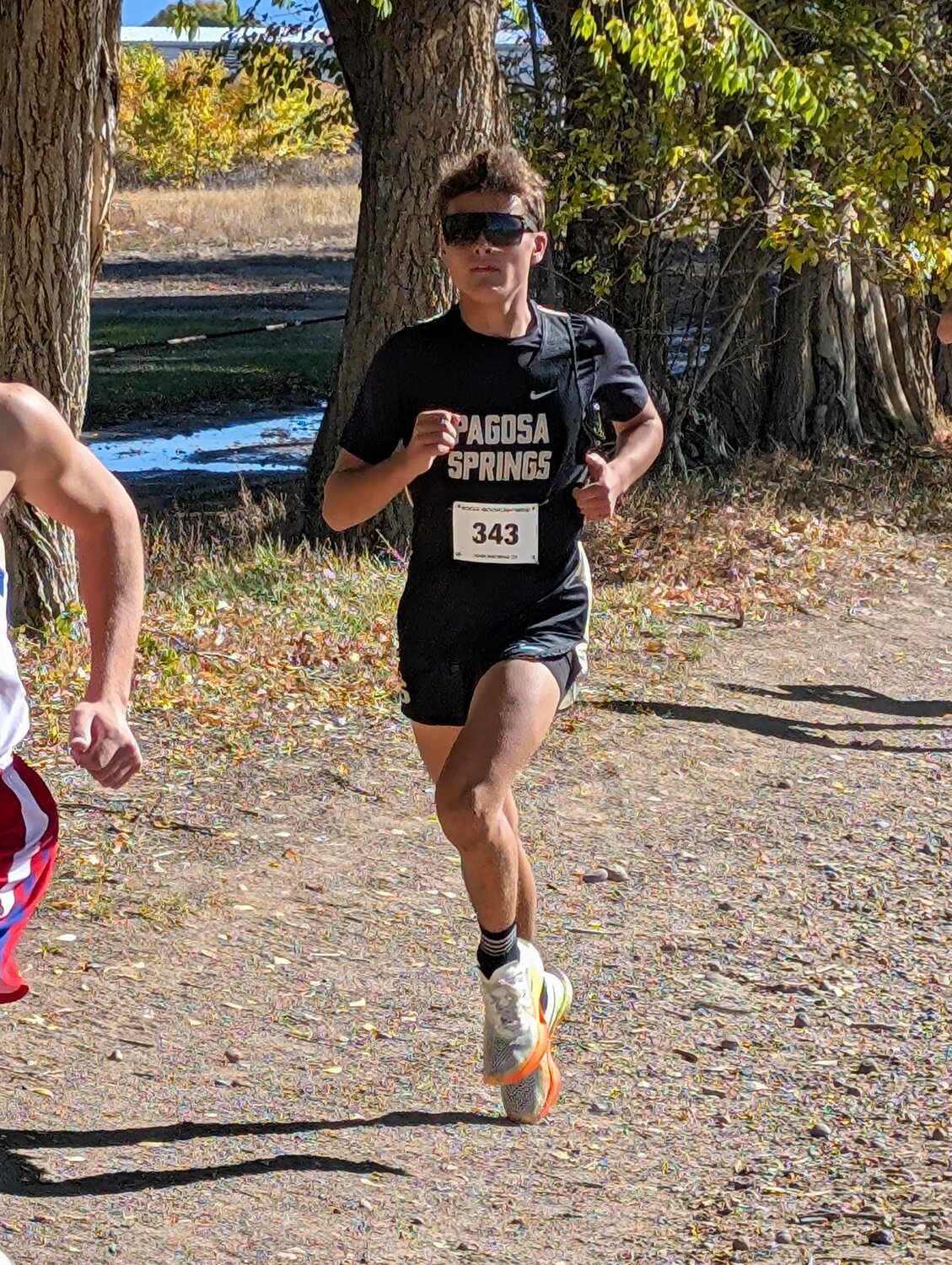 Pirate Rylan Ash runs en route to a first-place finish at the Oct. 17 Eric Wolff Invitational. Today, Oct. 23, Ash and his fellow Pirates are taking part in regionals with the goal of qualifying for state.