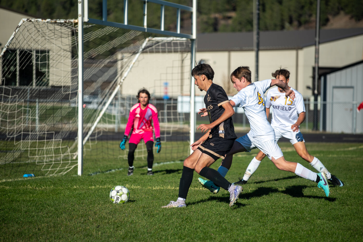 Angel Ramirez looks to fire a shot on the Bayfield goal as he creates space inside the Wolverines&rsquo; penalty area, shielding the ball from multiple defenders.