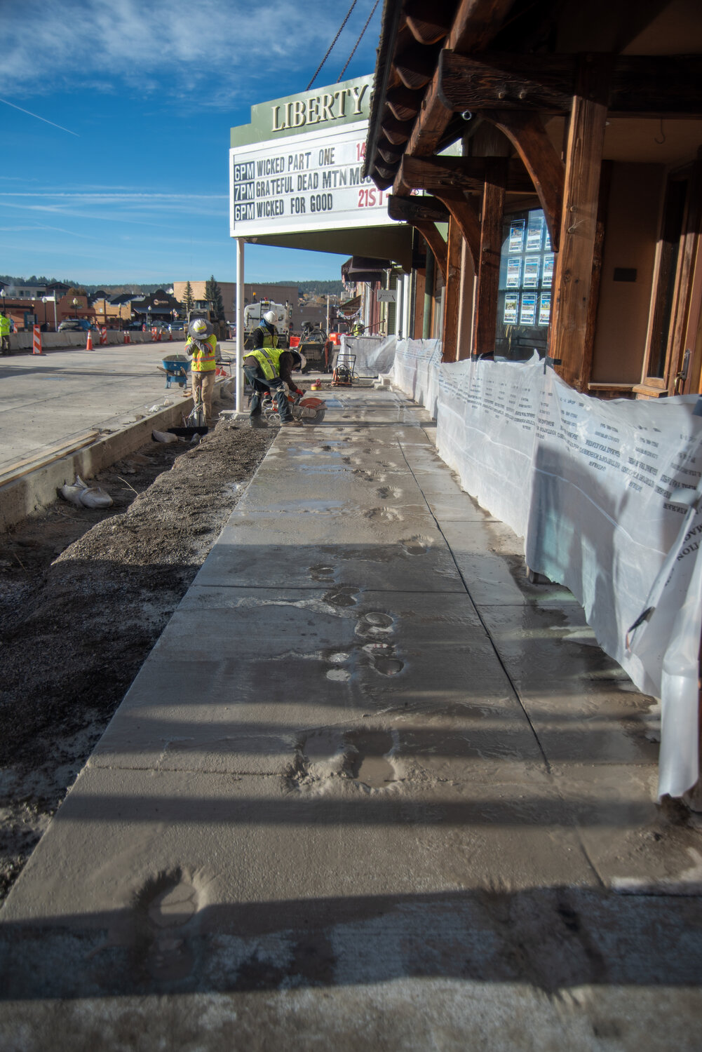 U.S. 160 reconstruction personnel work prepping newly poured concrete for removal Wednesday morning after someone entered the work zone the night before and damaged the concrete.