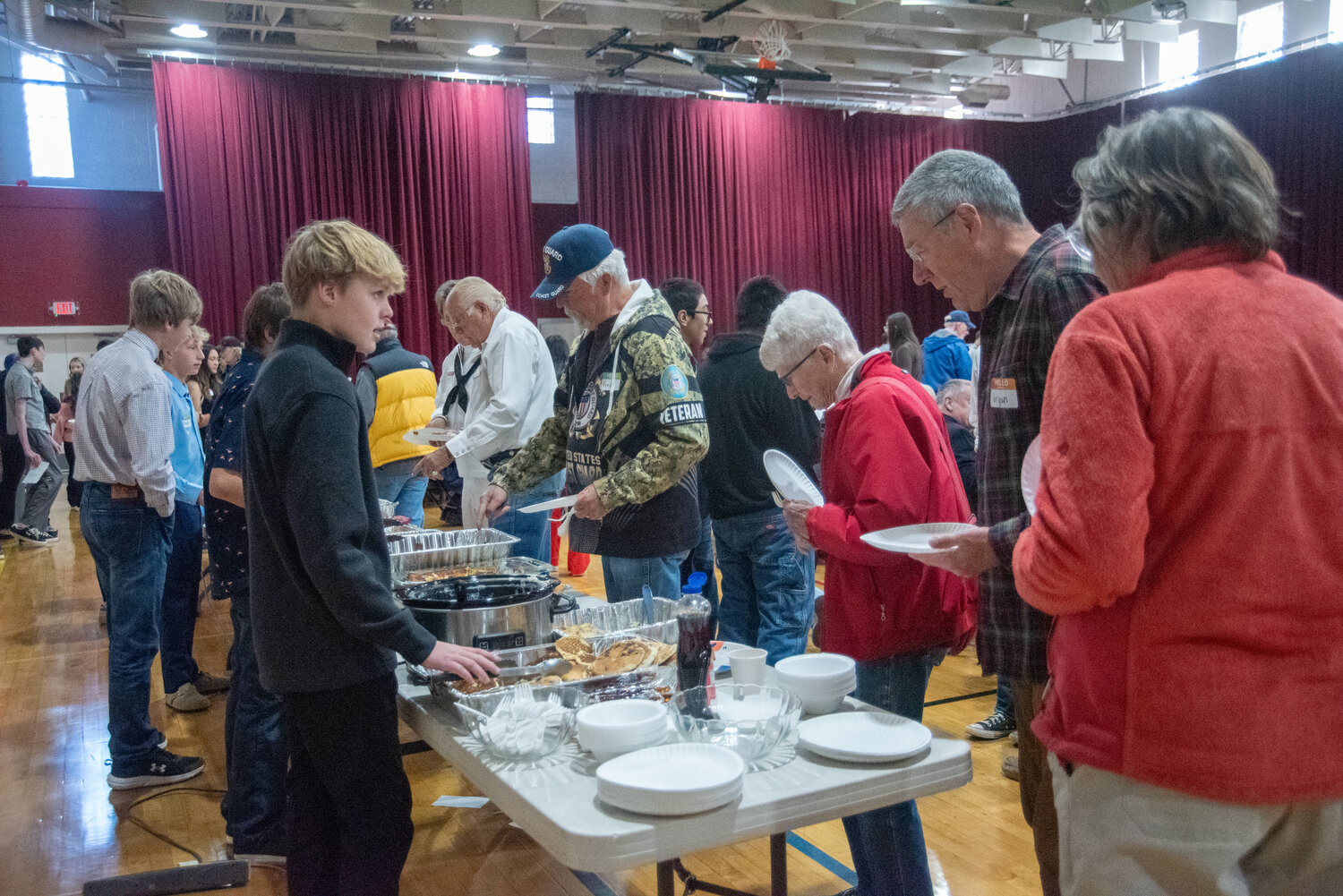 Pagosa Springs Middle School eighth-graders treat veterans to breakfast at the school&rsquo;s annual Veterans Day event. The veterans breakfast began in 2001.