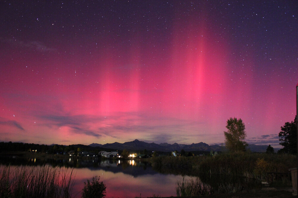 Third place went to John Farley, "Aurora Borealis, Village Lake."