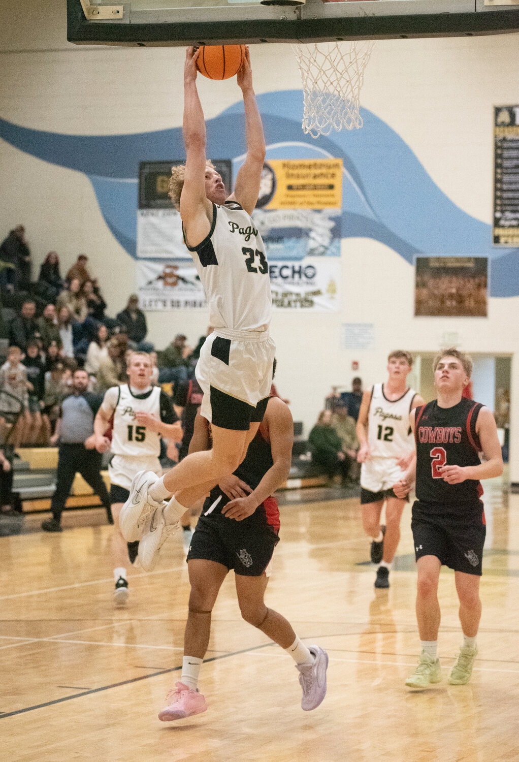 Pirate Jeremiah Jones goes up for a dunk against the Gunnison Cowboys on Saturday, Dec. 6. The Pirates went 1-1 at the Wolf Creek Classic and defeated Gunnison 73-45.