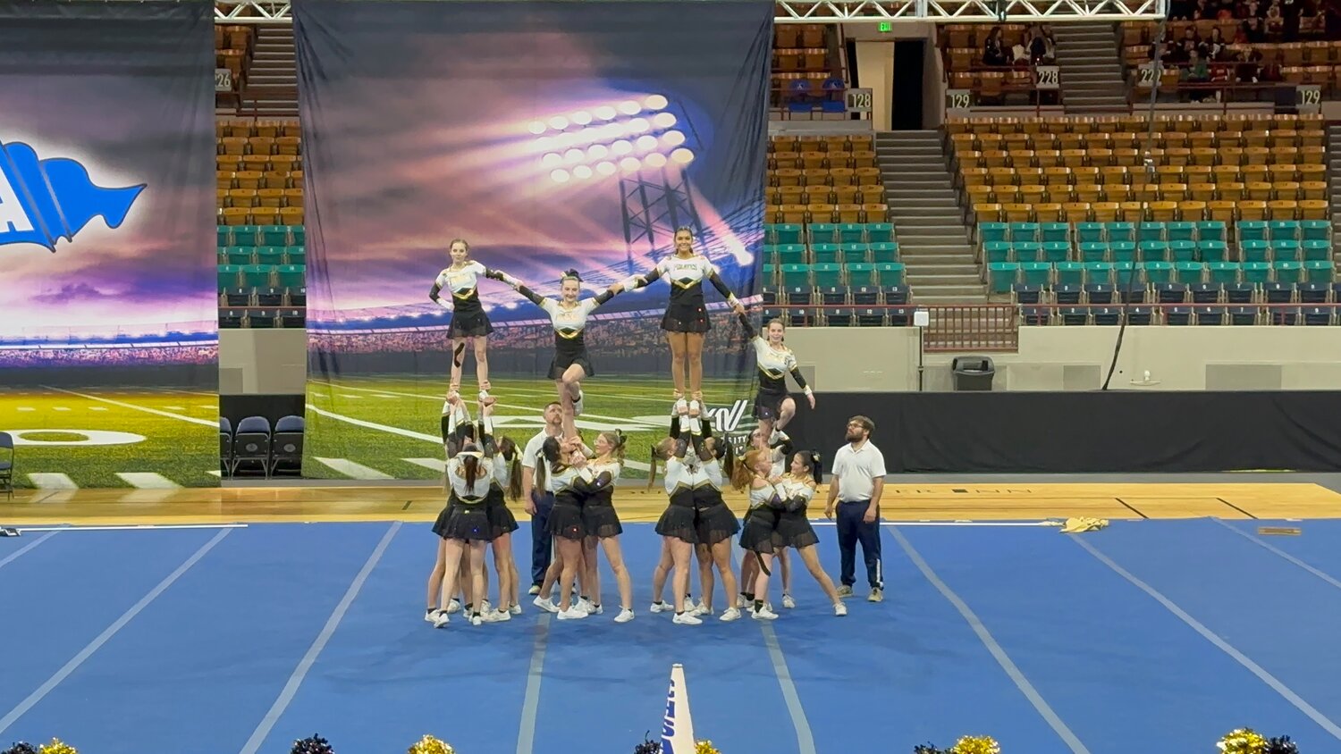 The Pirate cheer team competes at the state spirit championships on Friday, Dec. 12. The team took sixth in the Coed 2A/3A division.