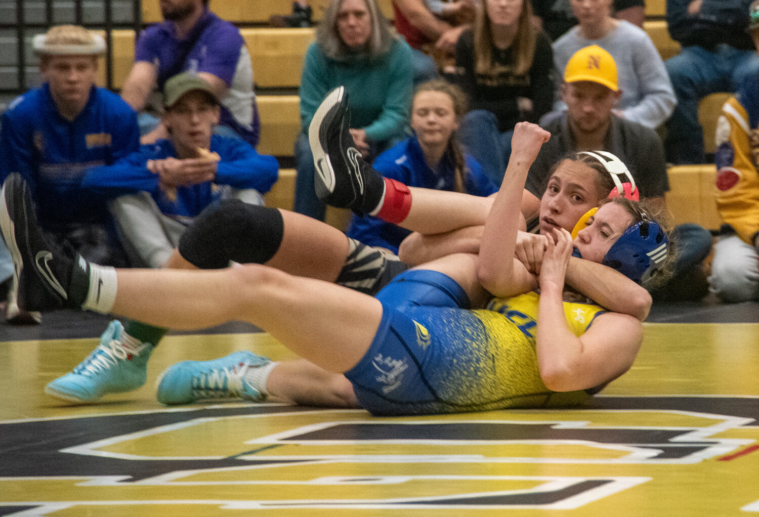 Lady Pirate Madisen Stretton eyes the clock during a match at the team&rsquo;s first-ever home tournament on Friday, Jan. 9. Stretton, as well as the team, took first on the day.
