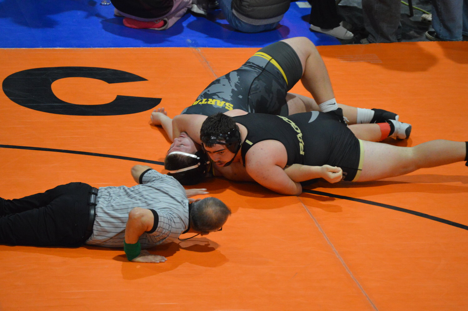 Pirate Hunter Martinez watches for a pin call at the Clash at the Coliseum on Saturday, Jan. 17, in Aztec, N.M. Martinez picked up eight wins at the tournament.