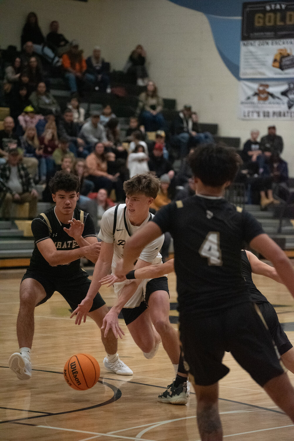 Pirate Ty Richey works through a pair of Monte Vista defenders during the teams&rsquo; back-and-forth matchup on Friday, Jan. 16. Richey had 14 points in the win.