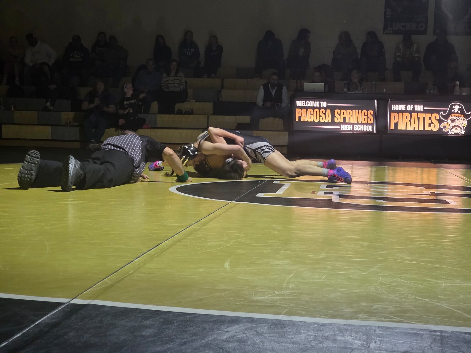 Lady Pirate Kyley Matyniak pins her opponent during the team&rsquo;s dual with Bayfield on Jan. 22.