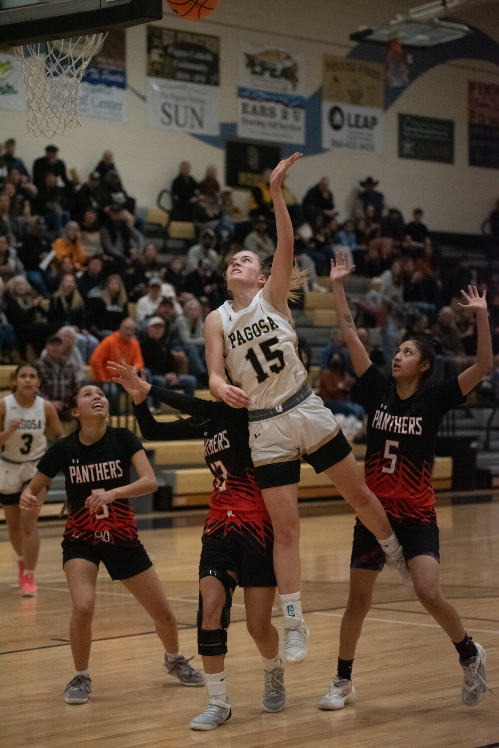 Lady Pirate Adelyn Hittle rises above a trio of Montezuma-Cortez Panthers for a shot during the team&rsquo;s 35-27 win on Saturday, Jan. 24. Hittle put up 11 points in the game.