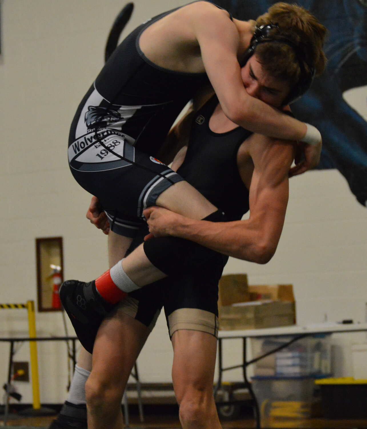 Pirate Eric Smith works to take down an opponent at the 3A regional tournament last week. Smith placed fifth, drawing his season to a close with a 28-20 record.