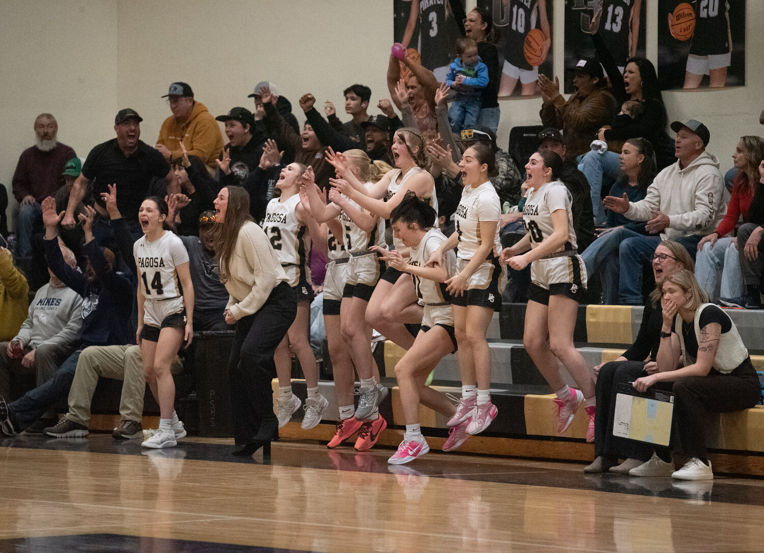 The Lady Pirates&rsquo; bench reacts to Addie Hittle&rsquo;s 3-pointer that put the team ahead 37-36 with seconds remaining Saturday. The Lady Pirates closed out the win and moved to 12-9 on the season.