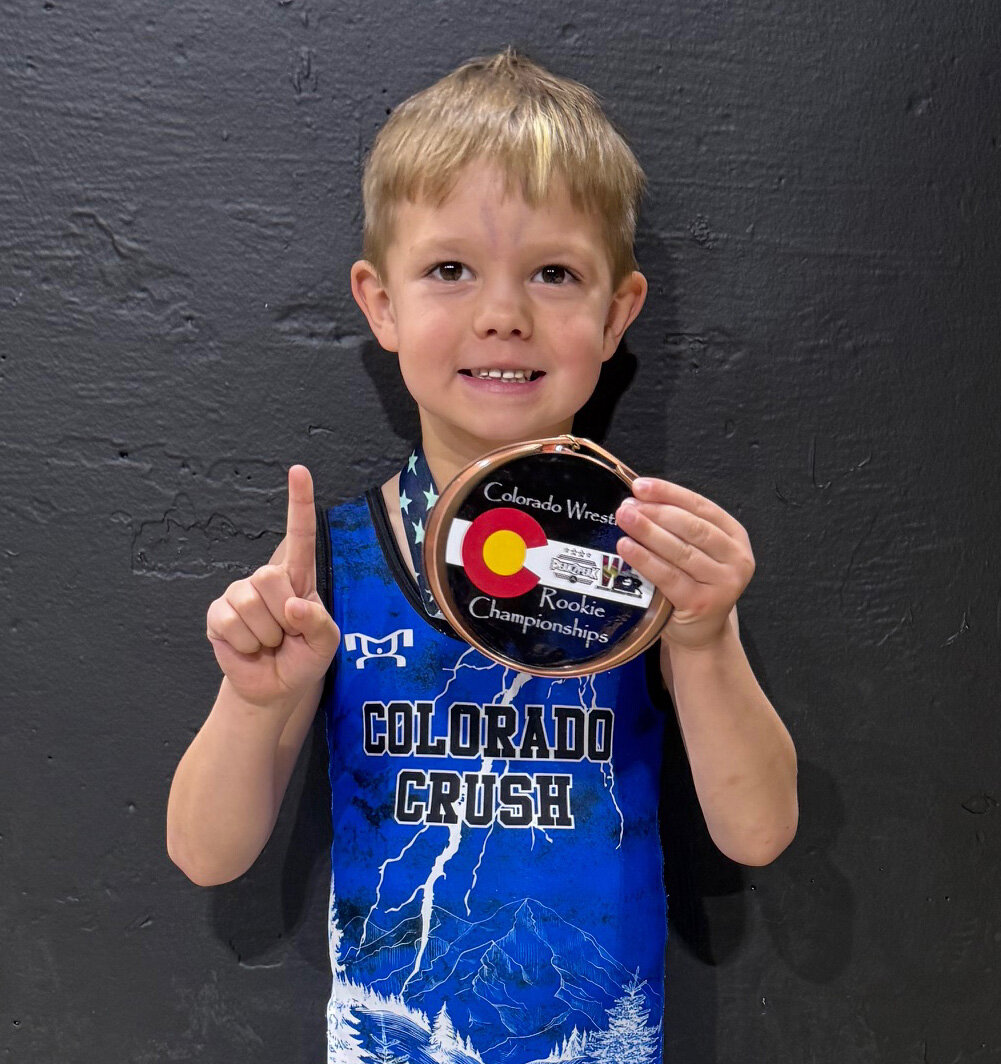 The Colorado Crush wrestling club, pictured alongside families and supporters, recently attended the Peak to Peak state tournament in Denver. According to coach Joel Hernandez, it was a really good season for the club, who ended up with three state placers: Sammy Haynie took fifth place, Kanon Crowther earned sixth place and Humberto Valezuela garnered fourth place.