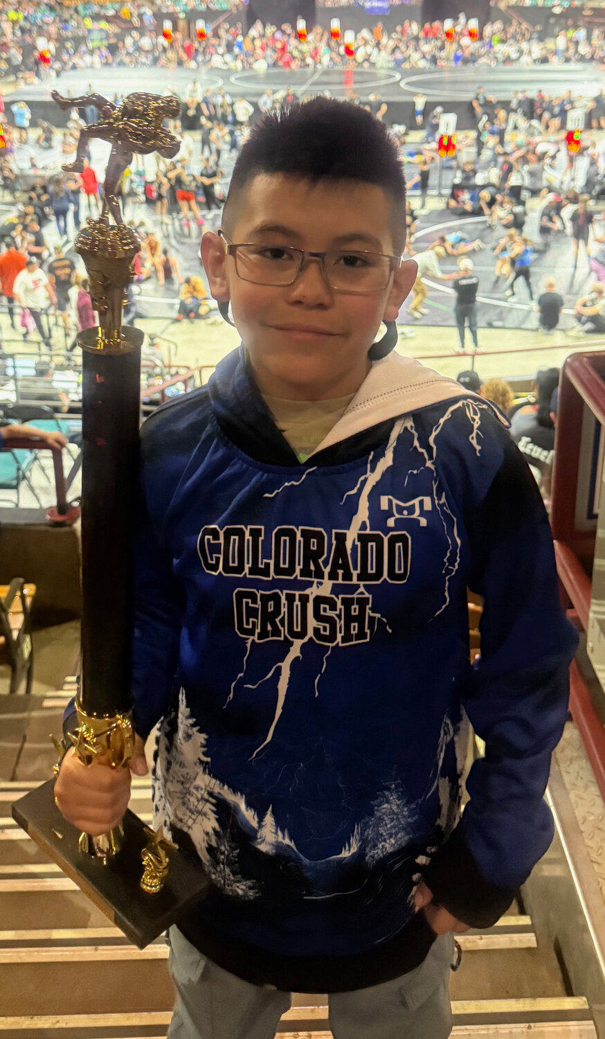The Colorado Crush wrestling club, pictured alongside families and supporters, recently attended the Peak to Peak state tournament in Denver. According to coach Joel Hernandez, it was a really good season for the club, who ended up with three state placers: Sammy Haynie took fifth place, Kanon Crowther earned sixth place and Humberto Valezuela garnered fourth place.