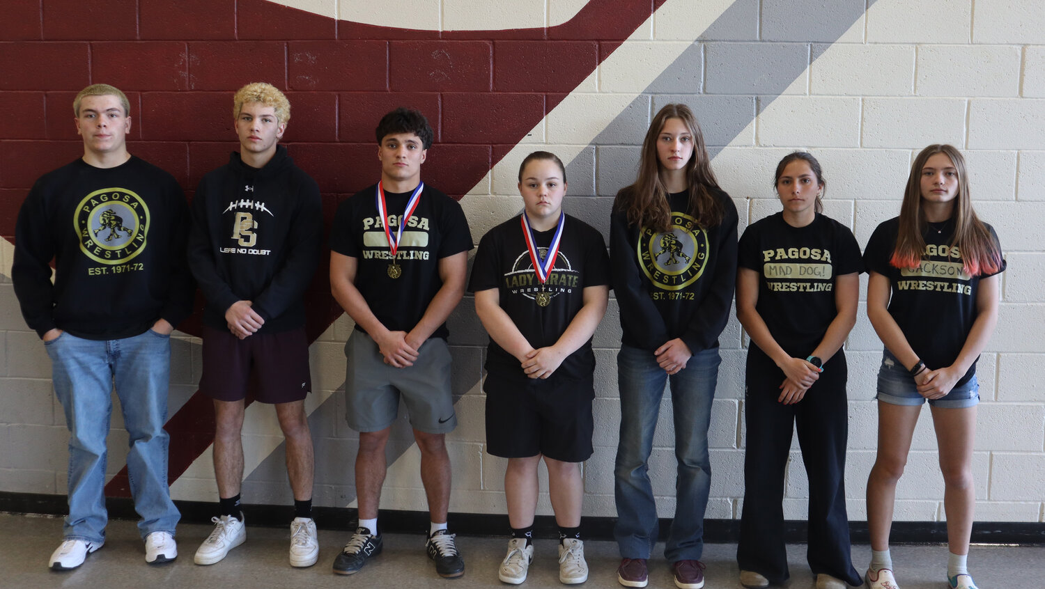 Several Pirate wrestlers recently received postseason honors for their work over the winter season. From left are Jimmy Elledge (all-conference first team), Hudson Mazur (all-conference honorable mention), Colton Lucero (all-state second team and all-conference first team), Laykyn Baxstrom (all-state second team and all-conference first team), Kyley Matyniak (all-conference first team), Madisen Stretton (all-conference first team) and Bella Jackson (all-conference first team).