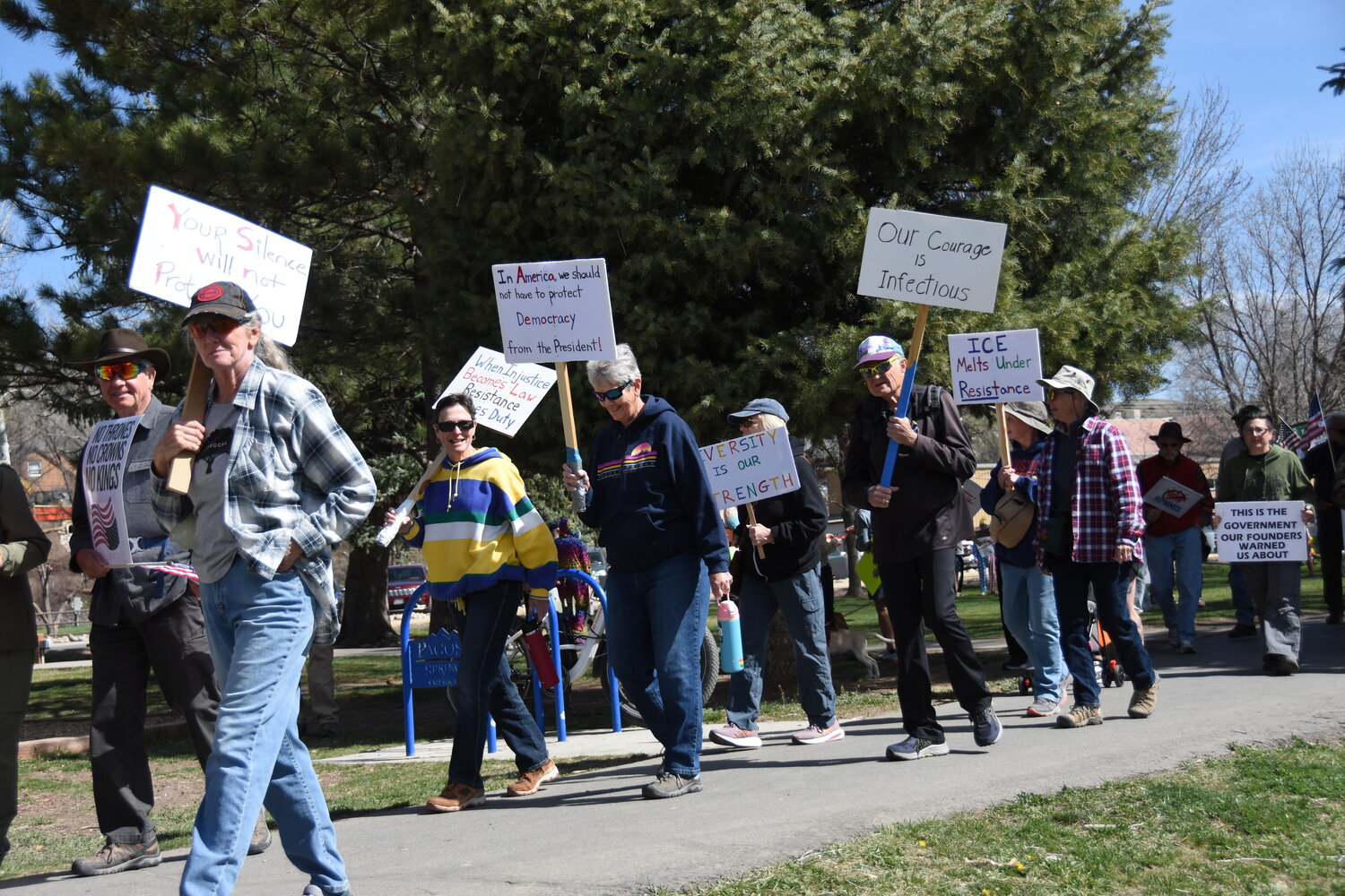 Hundreds took to Town Park and the sidewalks downtown on Saturday, March 28, as part of the nationwide No Kings demonstrations protesting actions of the current presidential administration.
