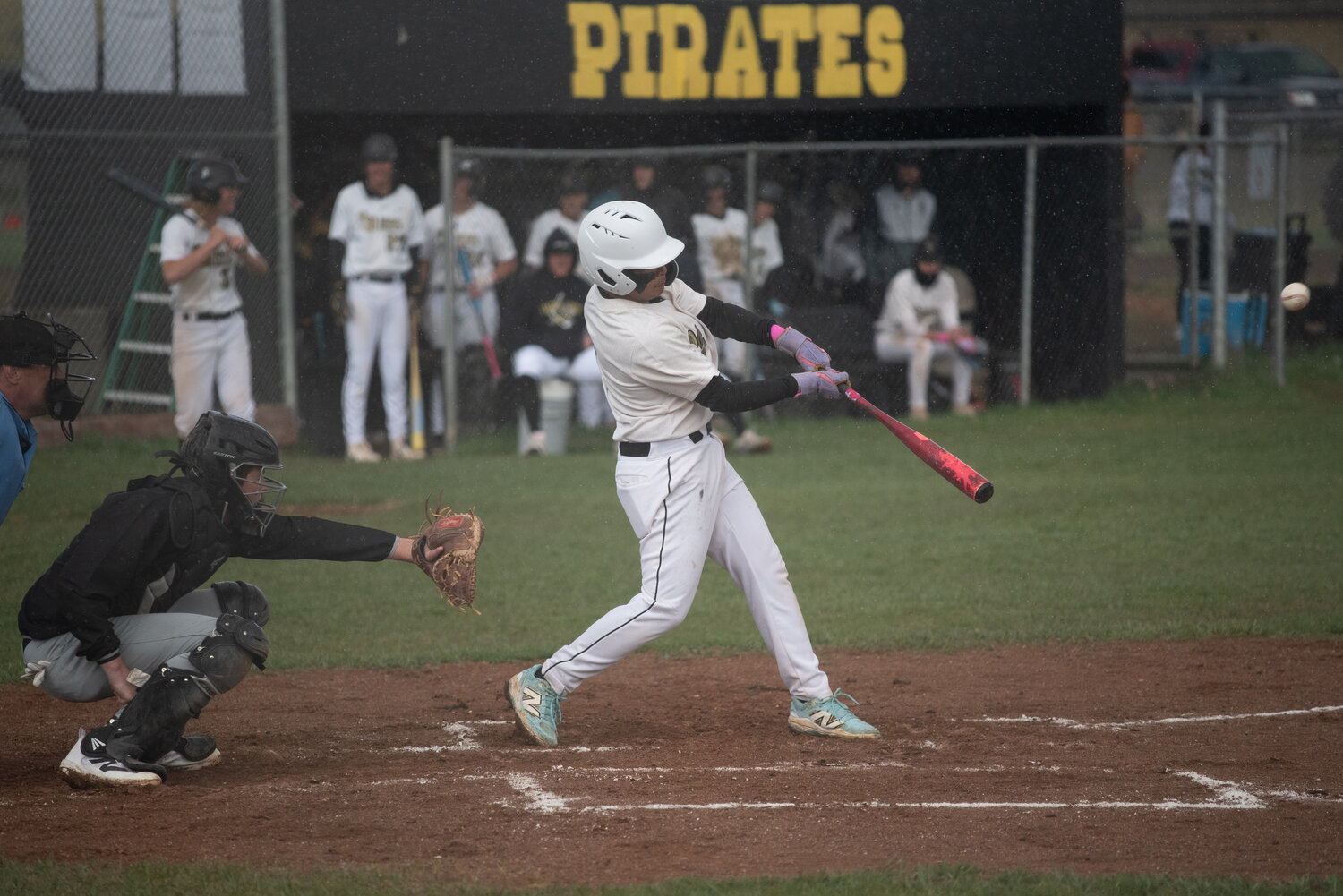 Pirate Sebastian Gonzalez swings on an RBI double during the second inning of the team&rsquo;s 18-3 win over the Sanford Indians on Tuesday. The Pirates won the first game of the doubleheader 18-3 and the second 14-0.