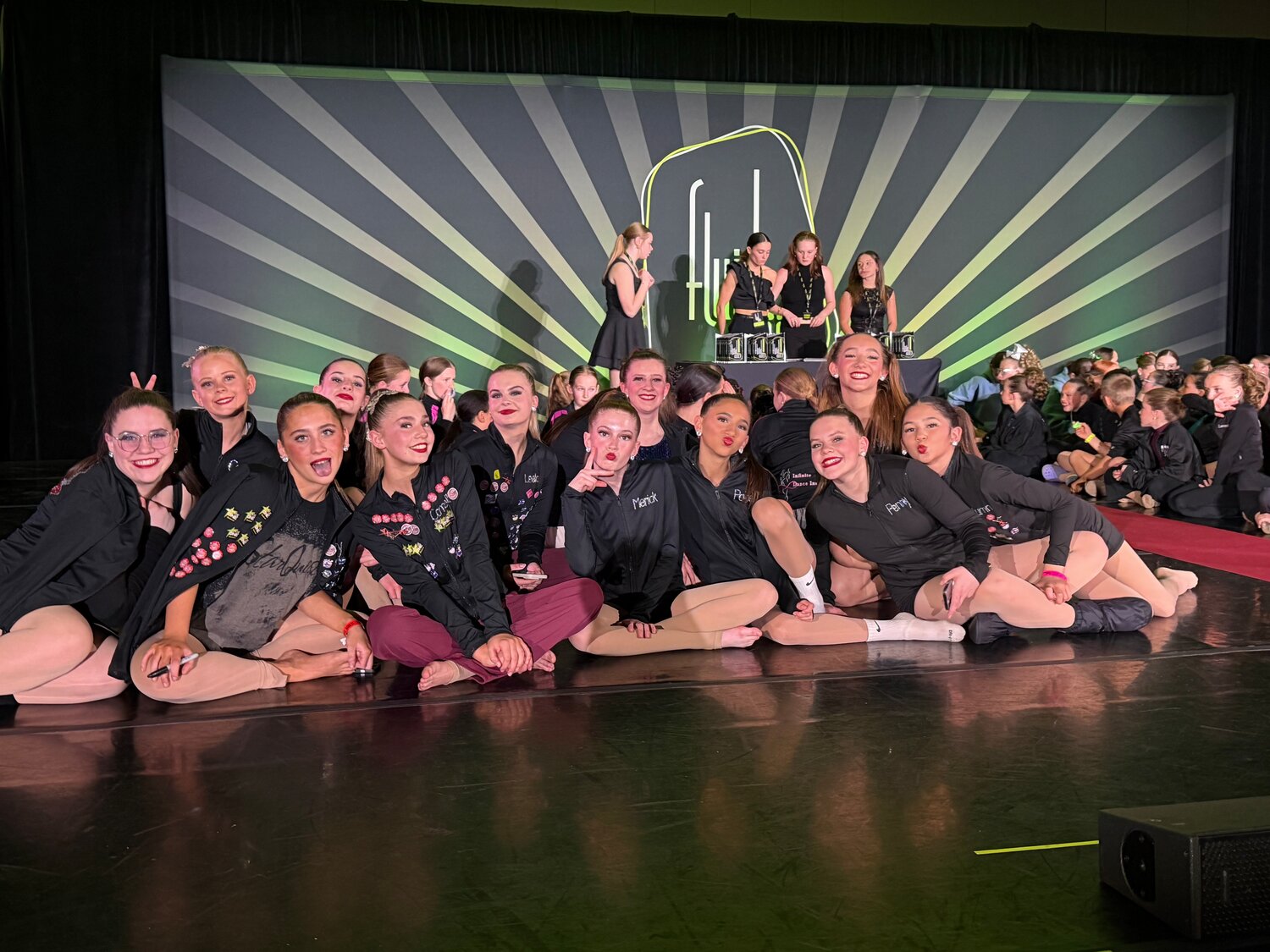 Expressions Dance Company members wait for the awards ceremony at the Fluid Dance Competition in Denver.
