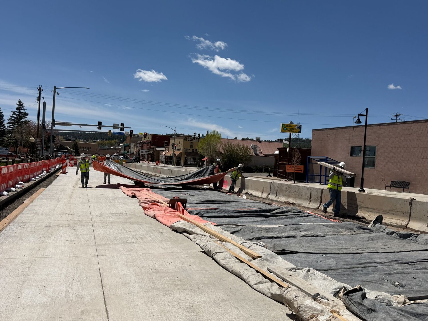 Concrete blankets used to protect the newly poured concrete and support the curing on U.S. 160.