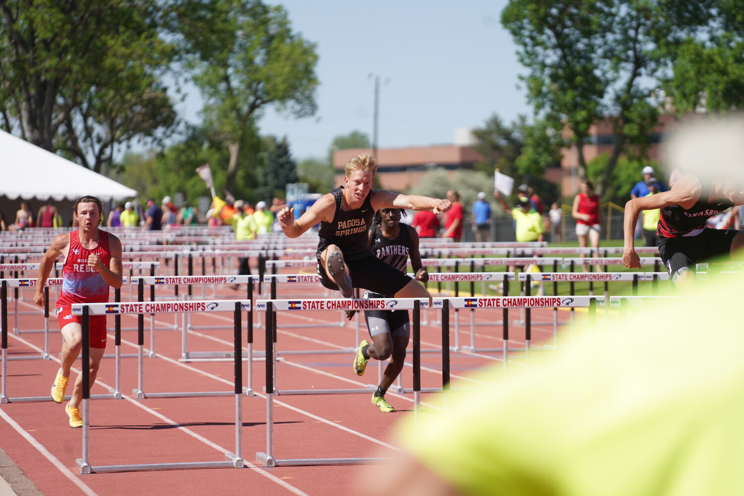 Pirates compete at the 3A state track and field meet in Lakewood on Thursday, May 14.  Jeremiah Jones heads toward a ninth-place finish in the prelims of the 110-meter hurdles before taking seventh in the finals.