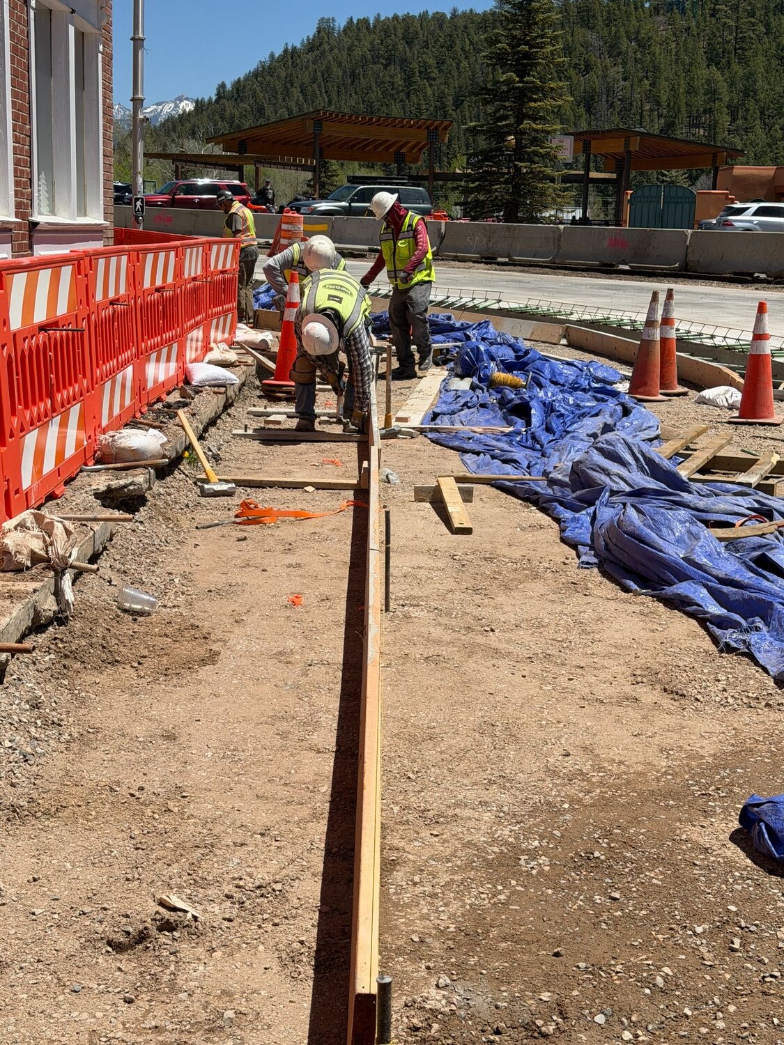 Curb, gutter and sidewalk work continues in the 400 block of U.S. 160.